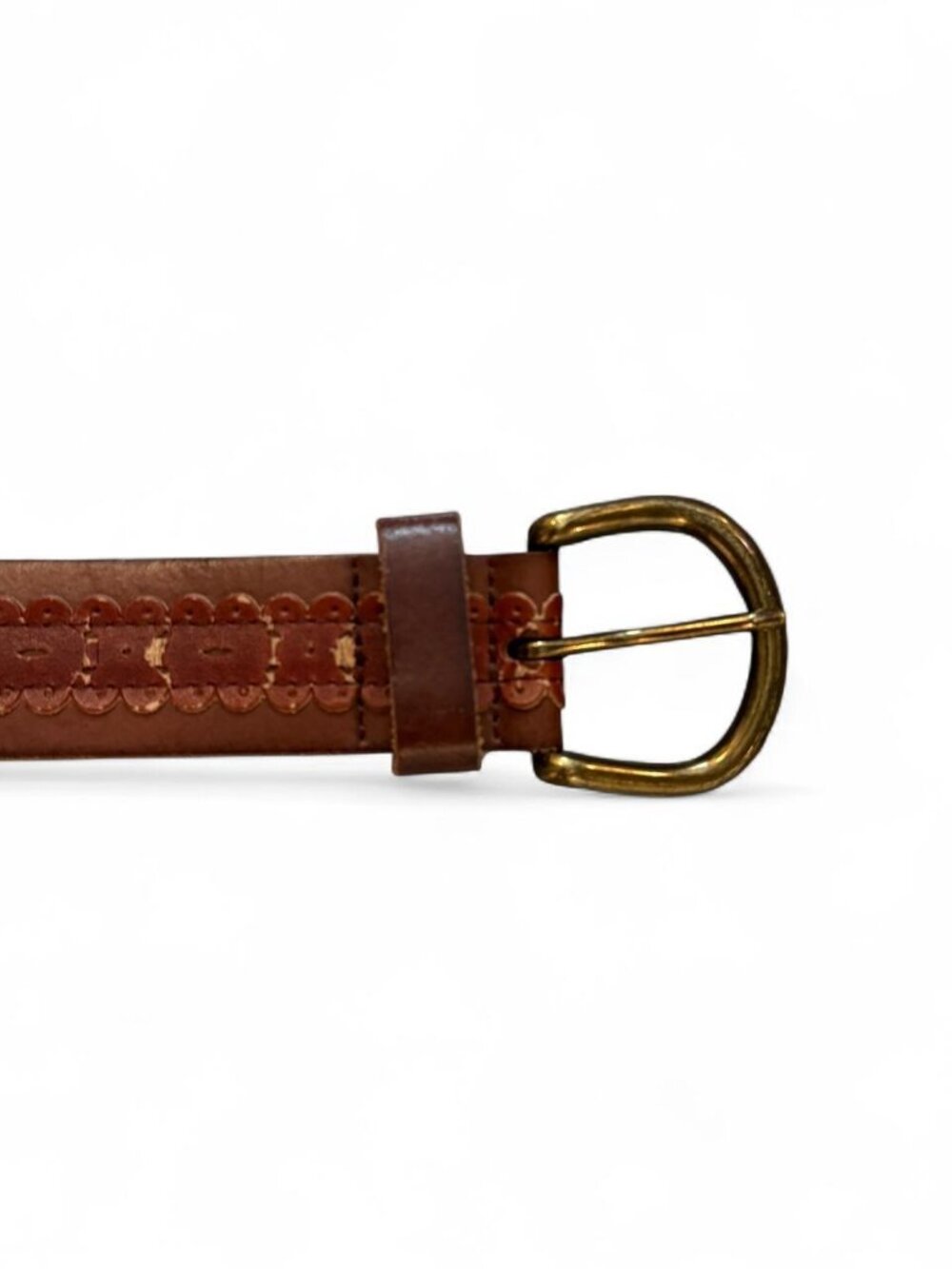 Brown leather belt with embossed repeating pattern